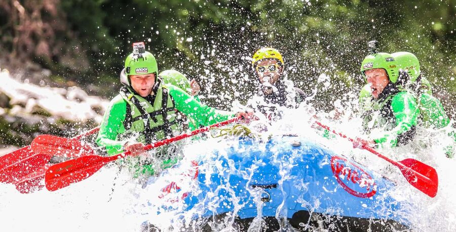 Imst: Rafting the Imster Gorge - Getting set up at Wiggi Rafting GmbH: showers, meadow, and warm gear