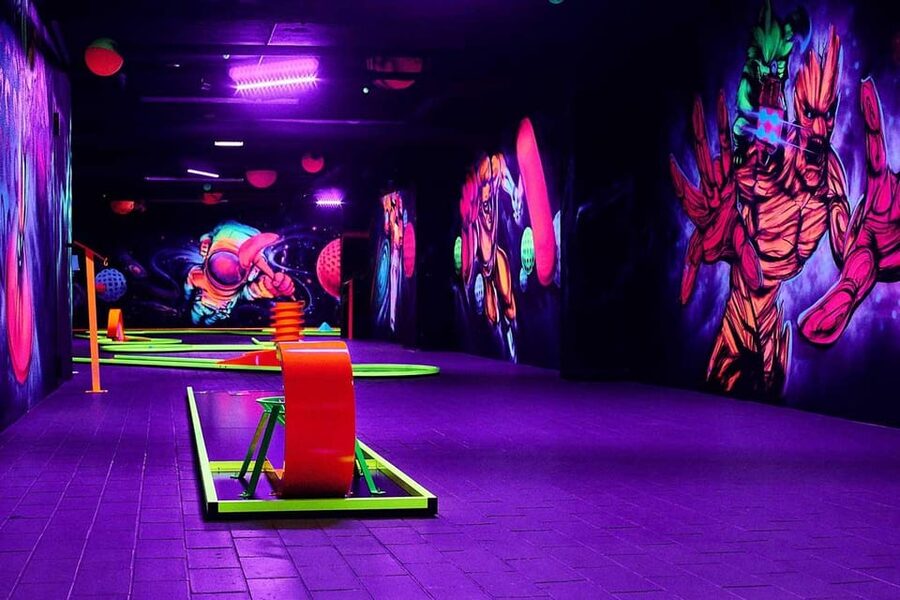 Innsbruck: 3D Mini Golf with Dazzling Light Effects - 18 UV-Lit Holes and 3D Wall Murals: The Real Attraction