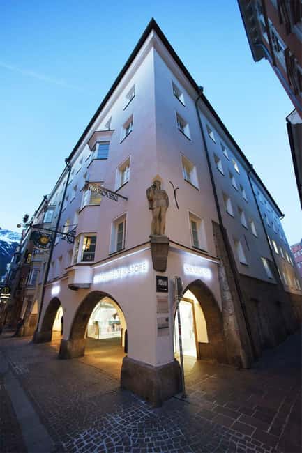 Innsbruck: Swarovski Exclusive Guided Tour with Drink & Gift - Timeless Wall and the showpiece route across both floors