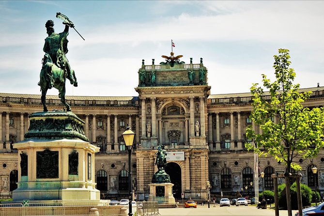 Private Vienna Driving Tour — Half Day Highlights & Photo Stops - Heldenplatz to the Ring: Hofburg Views, a Hitler Balcony Detail, and Big-City Architecture