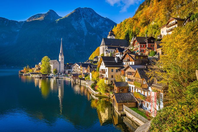 Salzkammergut and Hallstatt Private Full-Day Tour from Salzburg - Stop 1: Rosewood Schloss Fuschl, emerald views in minutes