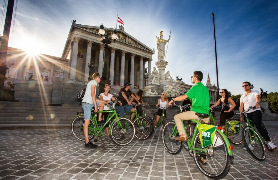 Vienna by Bike 3-Hour All-In-One City Bike Tour in English - Rathaus Gothic façade and the Austro-Hungarian Parliament era