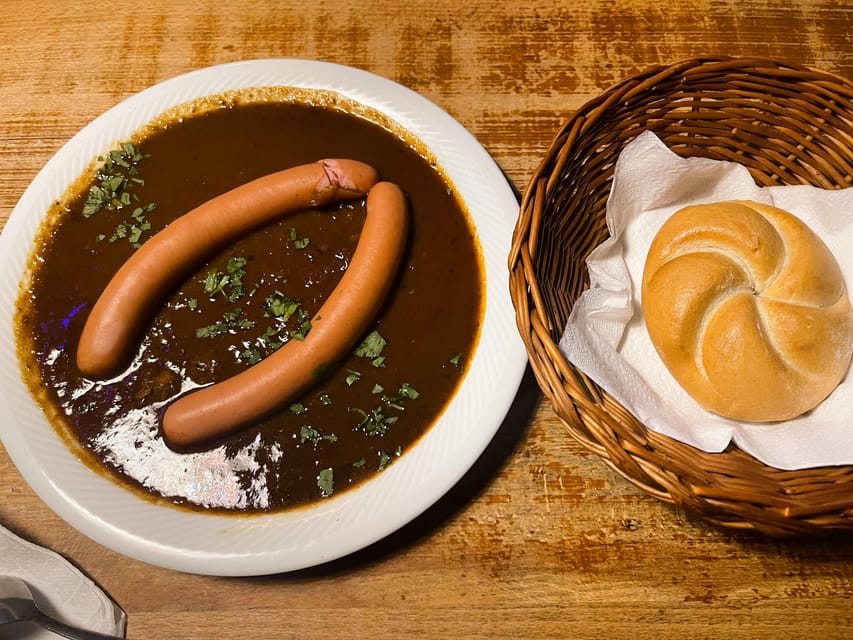 Vienna: Food tasting tour of Hidden Gems (Small Groups) - Stop 3: Wine tasting paired with Wiener sausage and goulash sauce