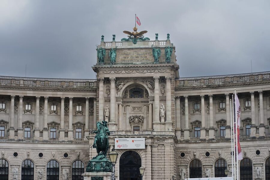 Vienna: Guided Walking Tour of City Highlights & Hidden Gems - Vienna State Opera façade: musical Vienna in stone and symmetry