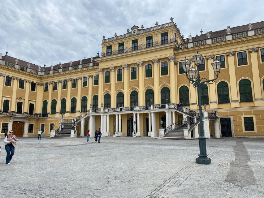 Vienna: UNESCO Schönbrunn Palace Guided Tour with Entry - Where You Start: Main Courtyard and the Italian Umbrella